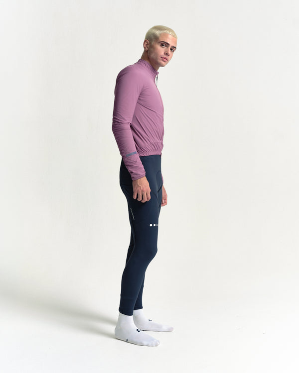 Model in the Men's Mono Insulated Jacket in Dusty Rose, full-length view.