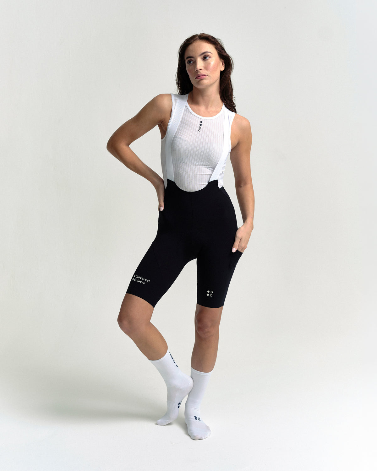 Model wearing the Women's Chroma Cargo Bib Shorts in Black.