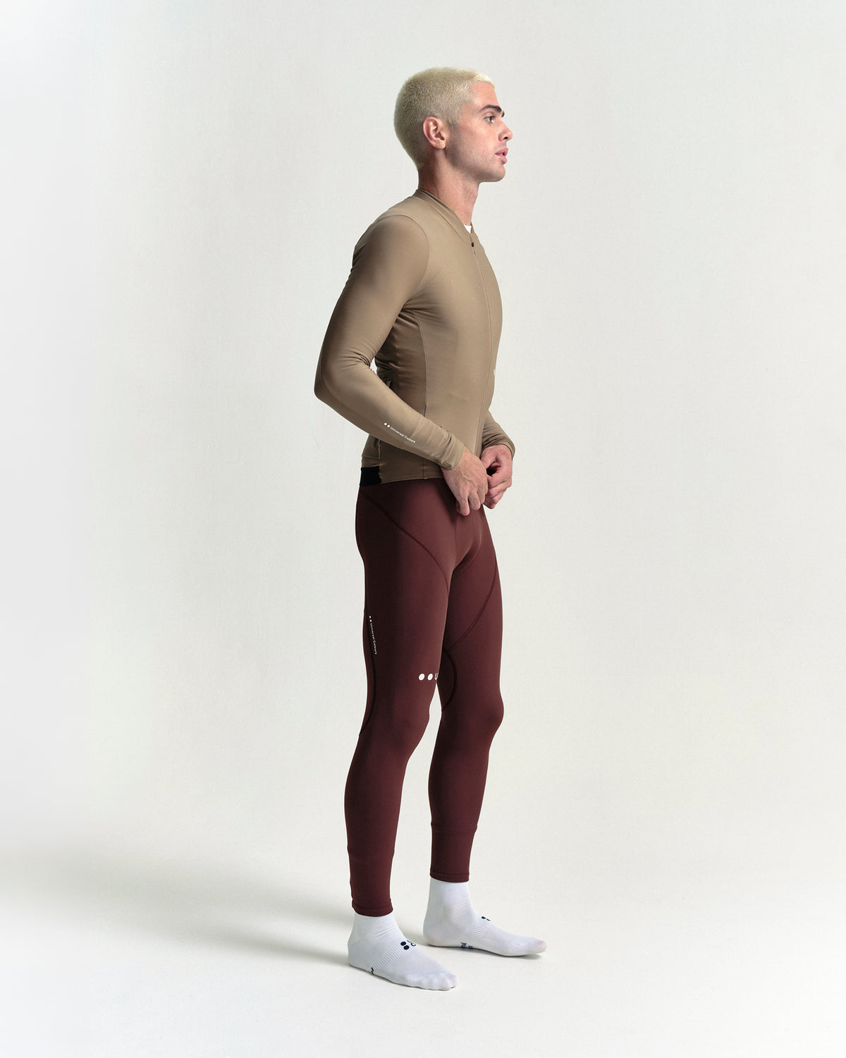 Model wearing the Men's Mono Long Sleeve Jersey in Walnut Brown.