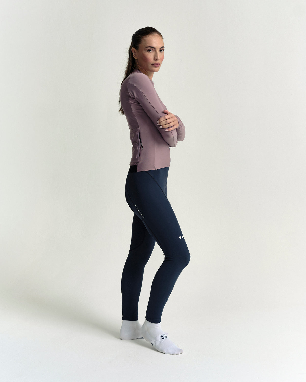 Model in the Women's Mono Long Sleeve Jersey in Mauve Mist, full-length view.