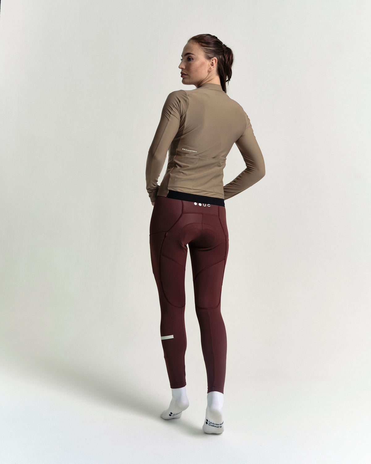 Model wearing the Women's Mono Long Sleeve Jersey in Walnut Brown.